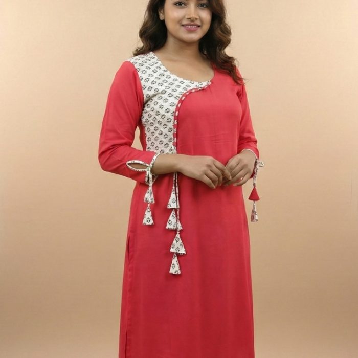 Women Solid Pink Viscose Rayon Kurti with Printed Yoke and Tassel Detail